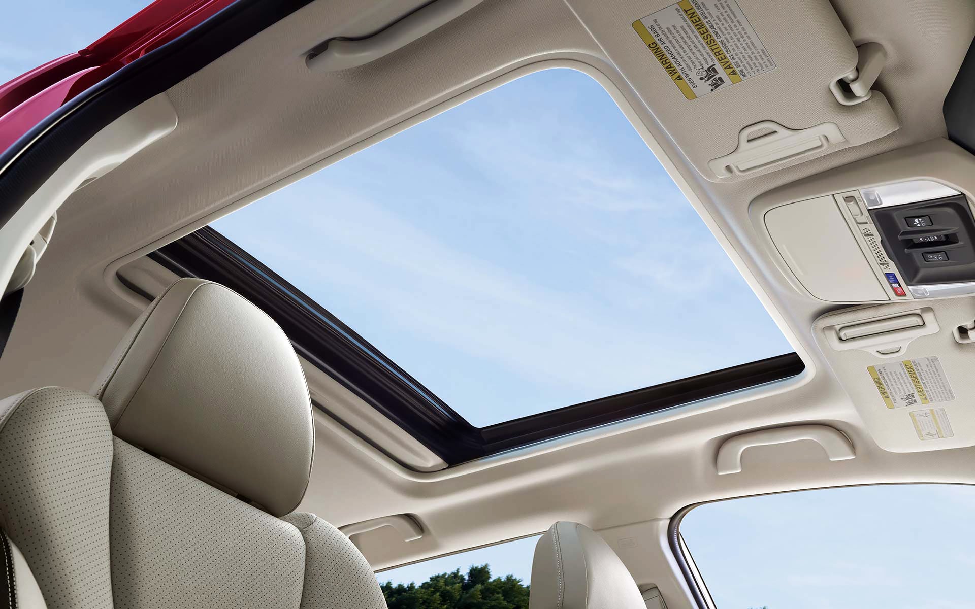 A view through the power sliding panoramic moonroof on the 2022 Forester Sport. | Subaru of Ann Arbor in Ann Arbor MI