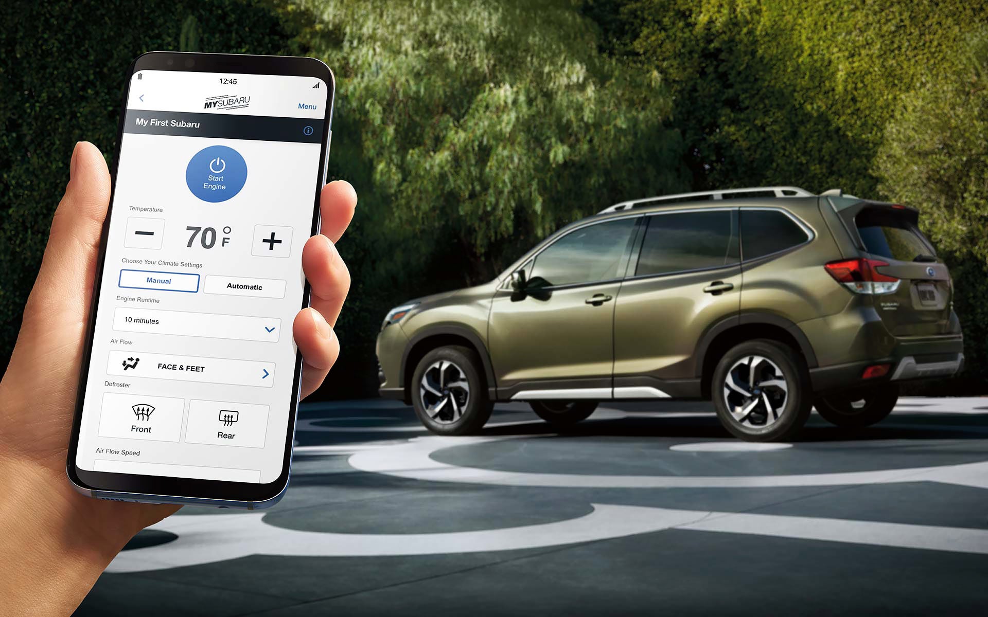 A close-up of a phone showing the Remote Engine Start with Climate Control feature of SUBARU STARLINK® Safety and Security available on the 2022 Forester. | Subaru of Ann Arbor in Ann Arbor MI