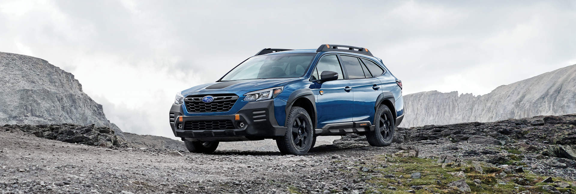 A 2023 Outback Wilderness parked in the mountains. | Subaru of Ann Arbor in Ann Arbor MI
